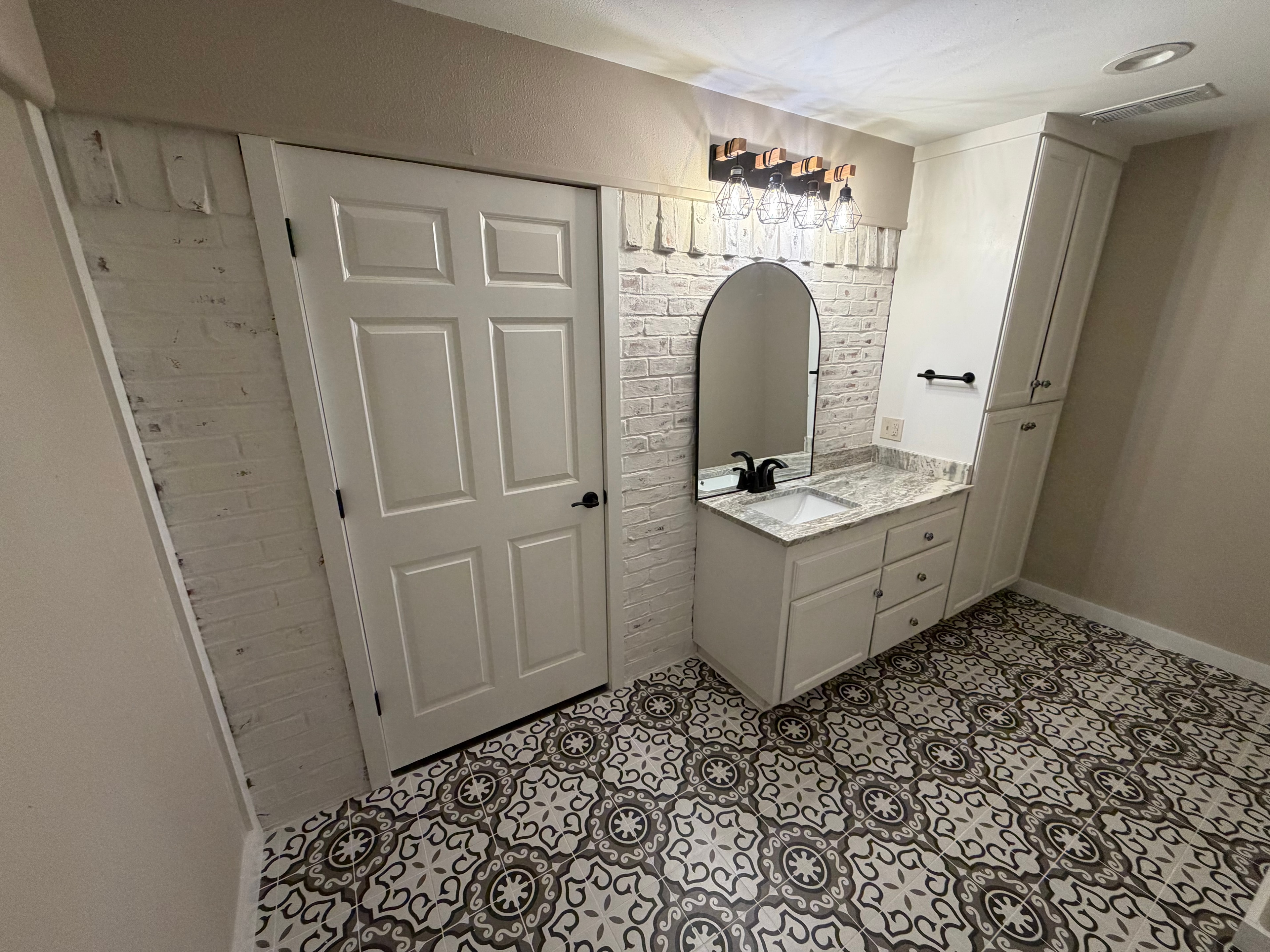 Modern bathroom with freestanding tub and marble shower